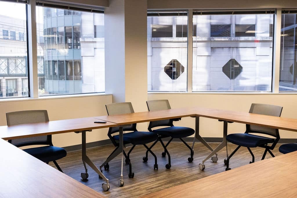 Conference room at McCormick Law & Consulting prepared for a practice sale negotiation